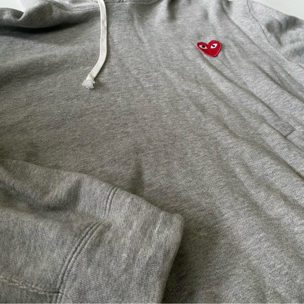 CDG Hoodie Size Large. Slim fit. Light grey colour.